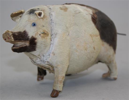 An early 20th century musical pig, probably French, 5.5in.